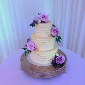 Buttercream,  Gold and fresf flowers Wedding Cake
