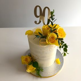 Tall Buttercream Cake with Flowers