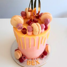 Tall Buttercream Drip Cake With Macarons